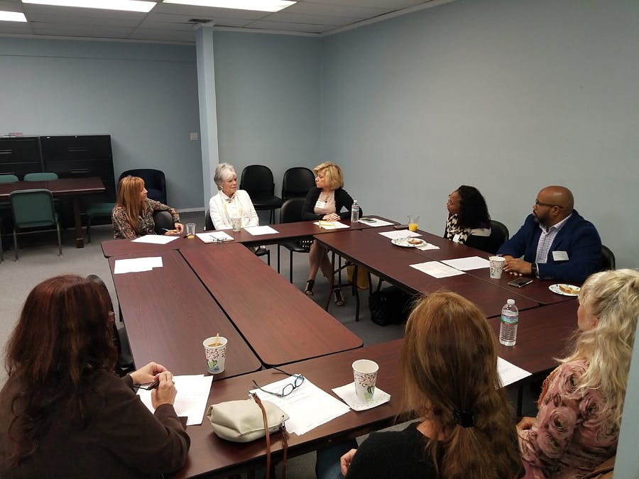 therapists meeting around conference table